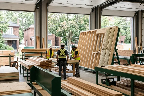 Garden suite wall panels being built in a factory