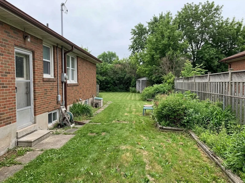 Before: deep Etobicoke backyard behind a 1950s bungalow